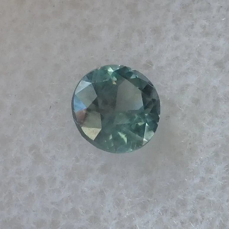 1.18 CTS. ROUND DIAMOND CUT MONTANA BLUE GREEN SAPPHIRE