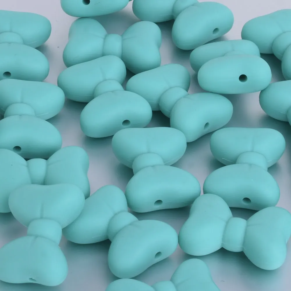 28.5*21*10.5mm Cute silicone bow beads 100% FDA food grade bead Chew Jewelry Beads DIY Teething Beads light blue 10pcs