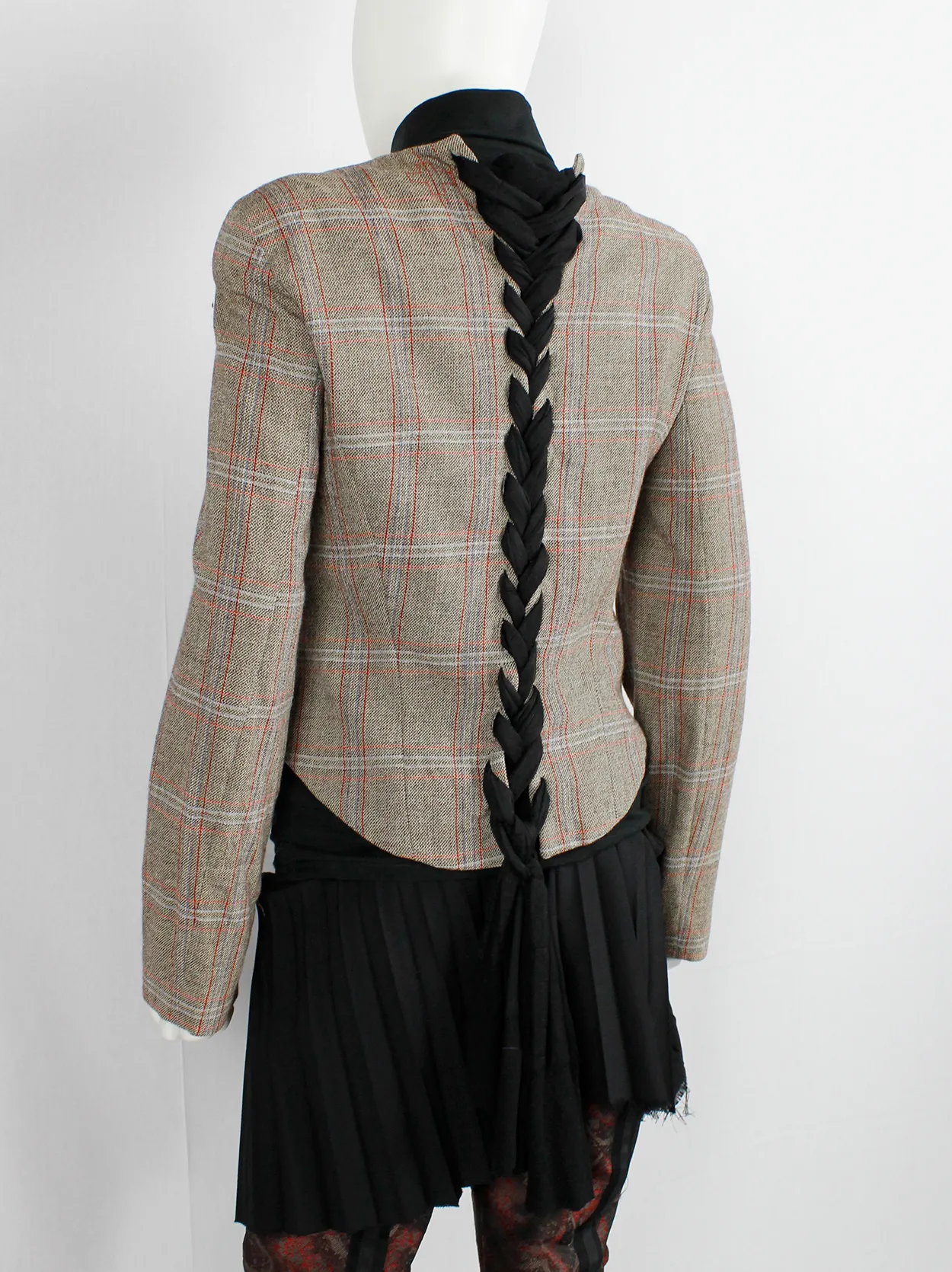 A.F. Vandevorst tartan corset jacket with braided pantyhose along the back — fall 2000