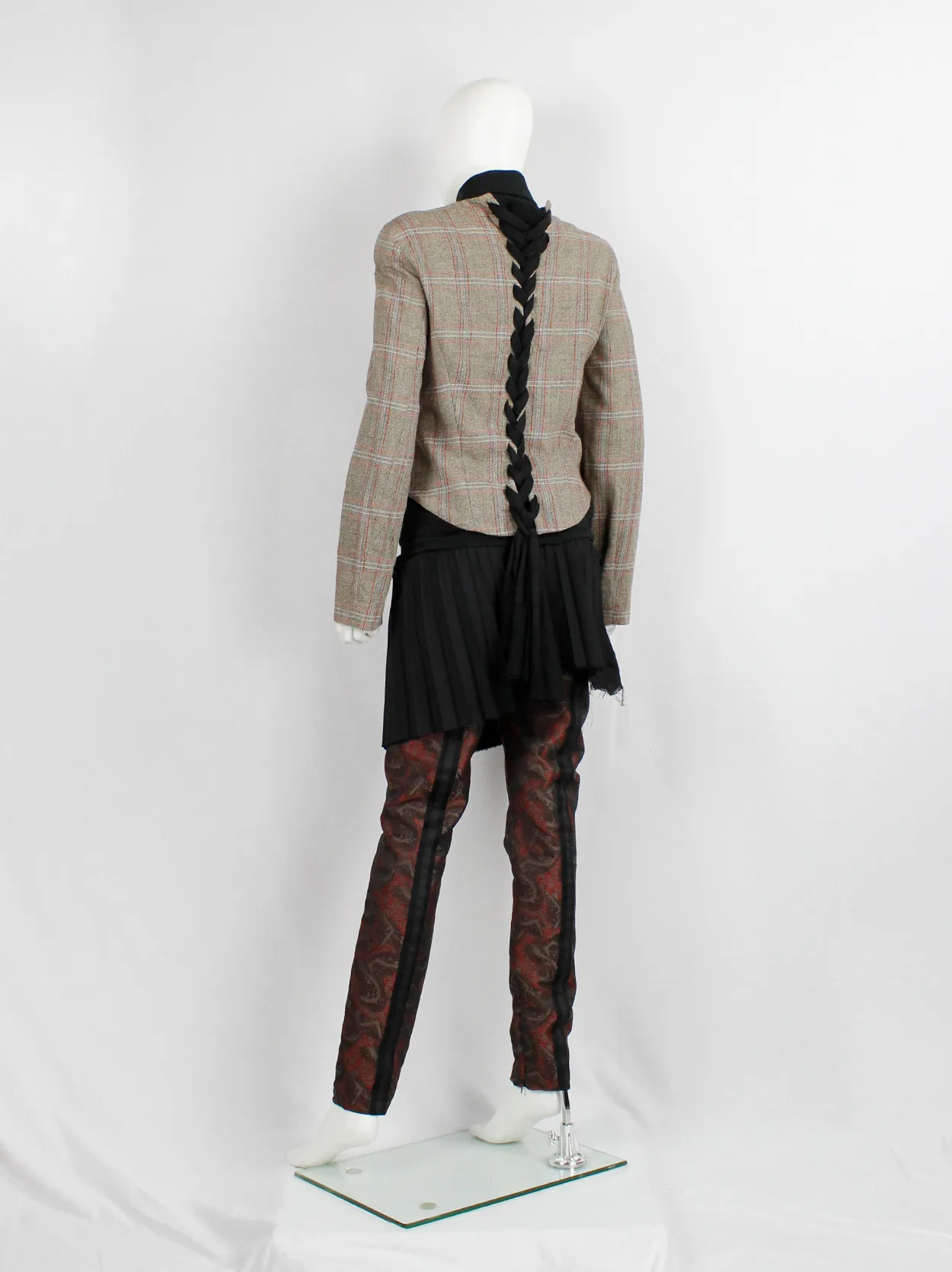 A.F. Vandevorst tartan corset jacket with braided pantyhose along the back — fall 2000