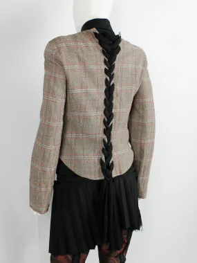 A.F. Vandevorst tartan corset jacket with braided pantyhose along the back — fall 2000