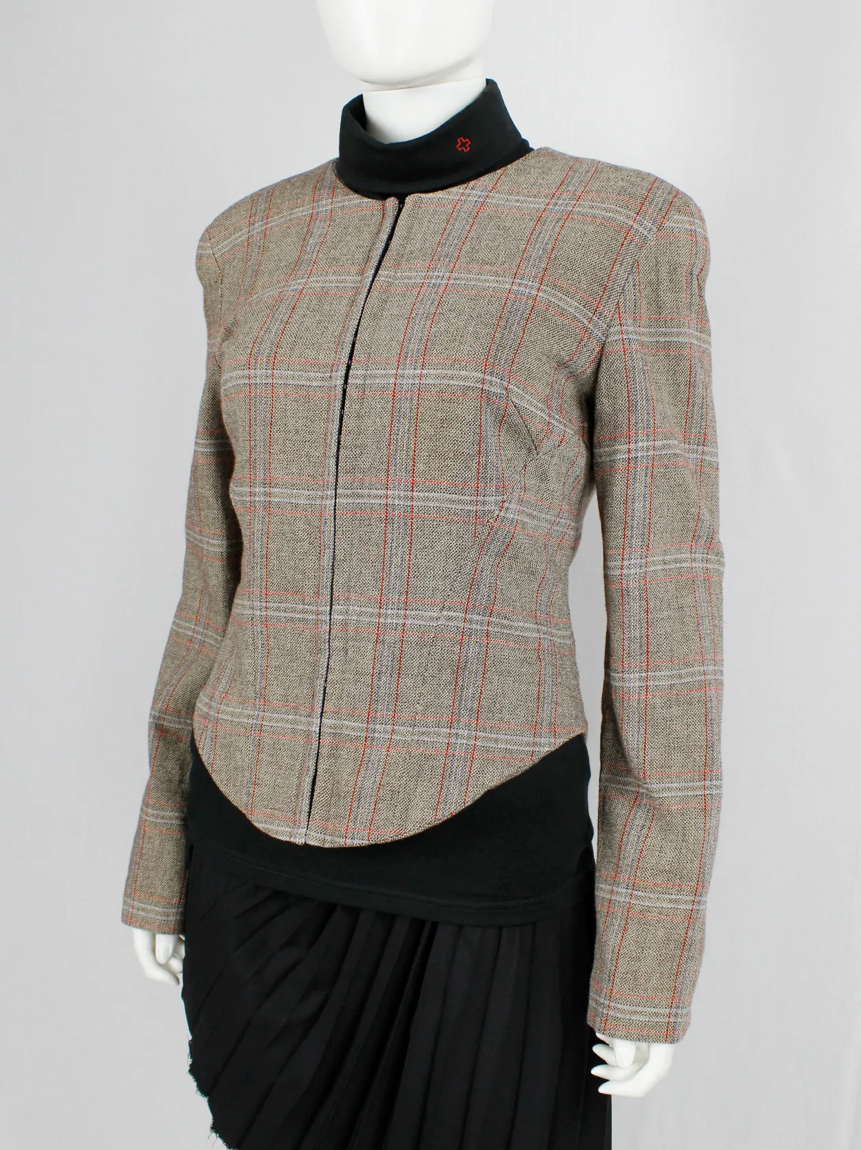 A.F. Vandevorst tartan corset jacket with braided pantyhose along the back — fall 2000