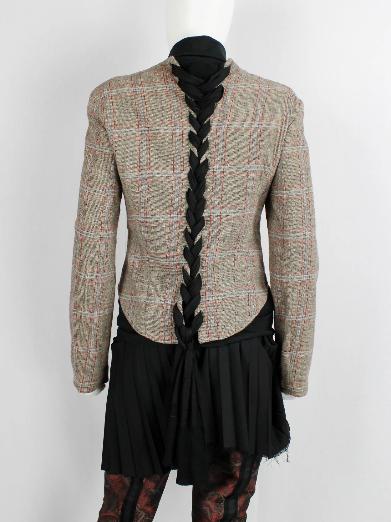 A.F. Vandevorst tartan corset jacket with braided pantyhose along the back — fall 2000