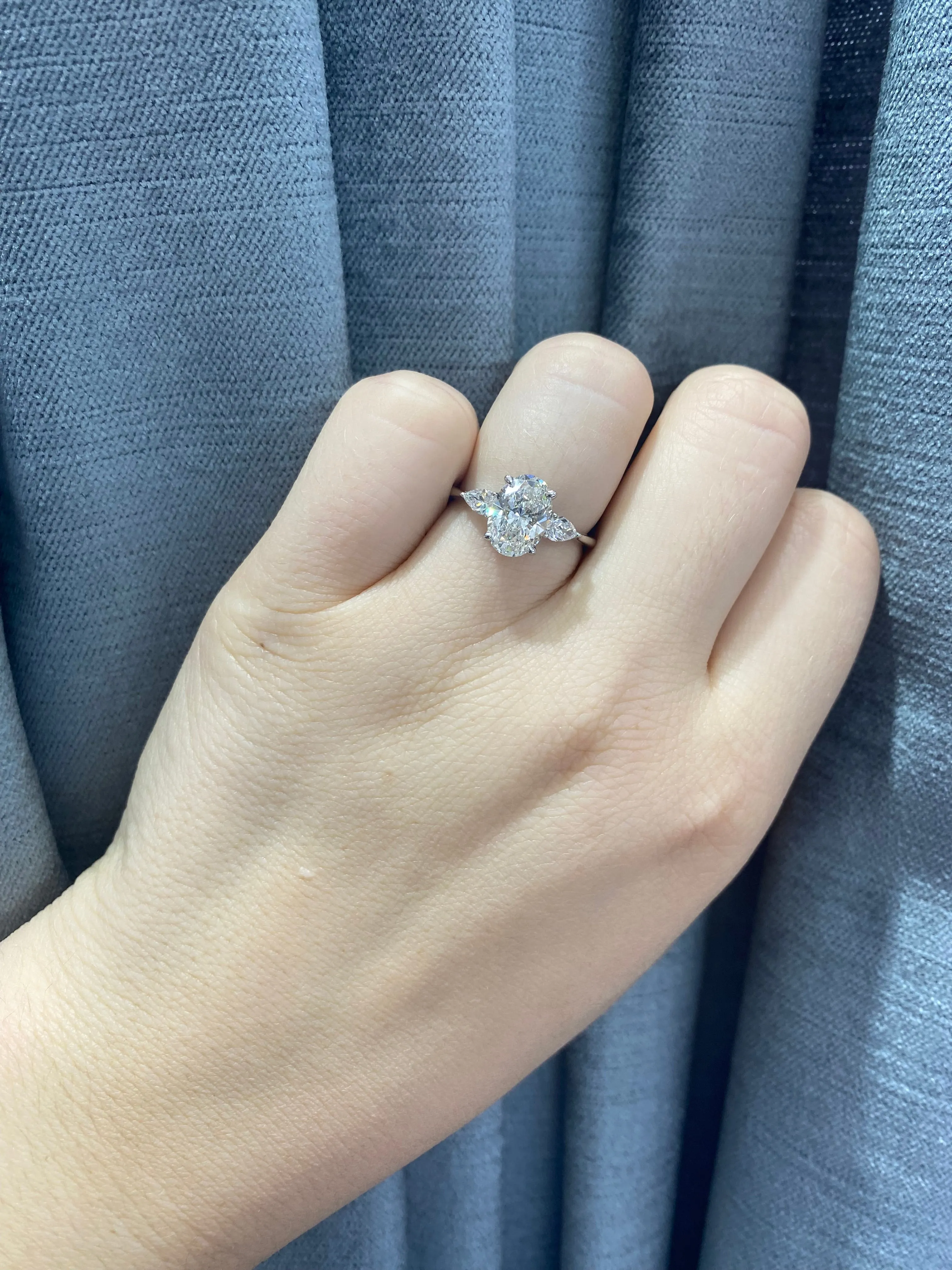 Ivy Three Stone Oval and Pear Engagement Ring