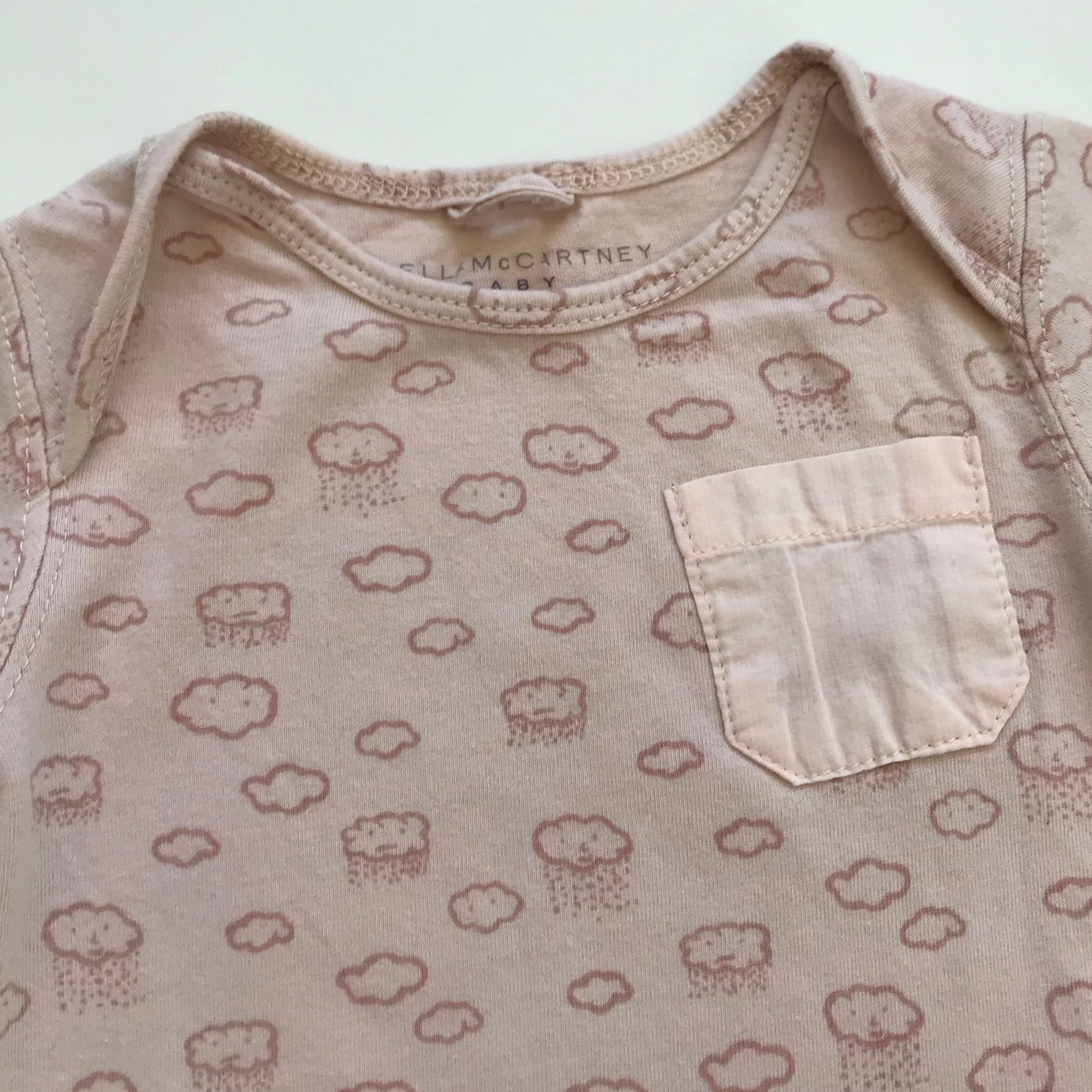 Stella McCartney Dusty Pink Cloud Print Onesie